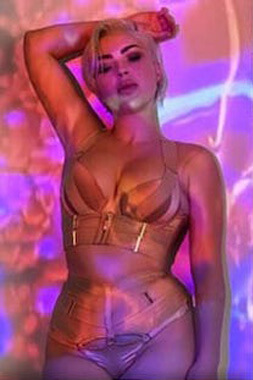 gold coast based female striptease artist dressed in burlesque style underwear ready for a show in coolangatta on the queensland nsw border