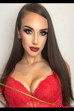 very attractive female striptease artist wearing red lace lingerie for a bucks party in sydney's seaforth